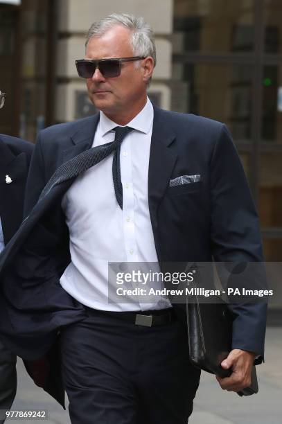 Former TV presenter John Leslie leaves Edinburgh Sheriff Court, he accused of putting his hand down a woman's trousers as they danced at her hen...