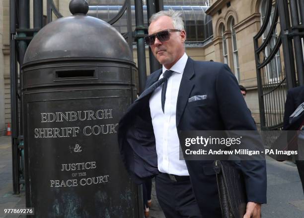 Former TV presenter John Leslie leaves Edinburgh Sheriff Court, he accused of putting his hand down a woman's trousers as they danced at her hen...