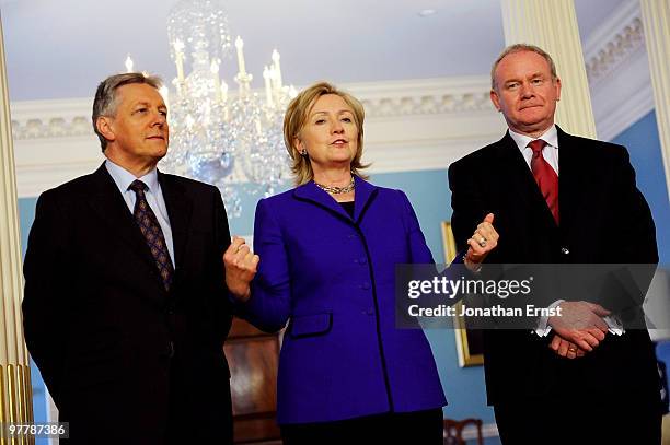 Secretary of State Hillary Clinton speaks to reporters with Northern Ireland First Minister Peter Robinson and Deputy First Minister Martin...