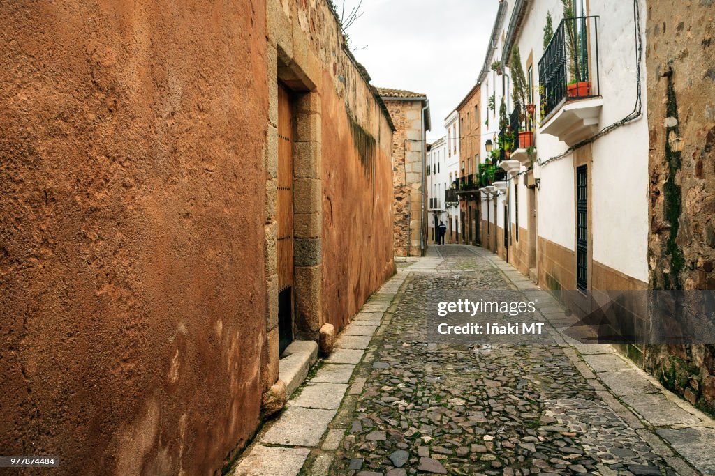 Cobblestone street in Old Town of Caceres, Extremadura, Spain