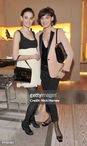Nina D'Urso and Ines de la Fressange attends the cocktail party for the launch of the 'Miss Viv' handbag collection by Roger Vivier on March 16, 2010...