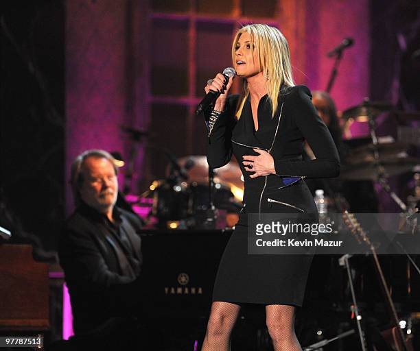 Benny Andersson of ABBA and Faith Hill perform on stage at the 25th Annual Rock and Roll Hall of Fame Induction Ceremony at The Waldorf=Astoria on...