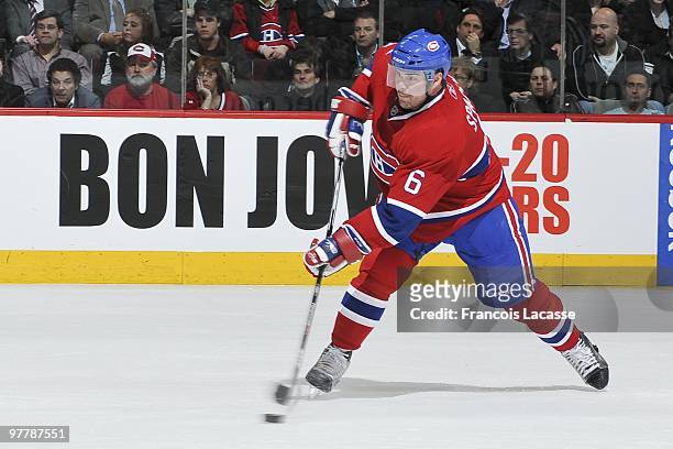 Jaroslav Spacek of Montreal Canadiens takes a slap shot during the NHL game against the Edmonton Oilers on March 11, 2009 at the Bell Center in...