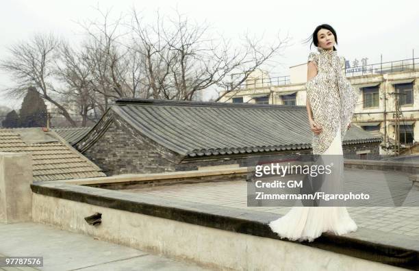 Actress Maggie Cheung poses at a portrait session in Beijing, China for Madame Figaro. Published image. CREDIT MUST READ: Gilles Marie...