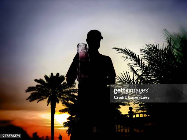 Webb Simpson poses with the trophy during the final round of THE PLAYERS Championship on THE PLAYERS Stadium Course at TPC Sawgrass on May 13, 2018...