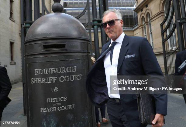 Former TV presenter John Leslie leaves Edinburgh Sheriff Court, he is accused of putting his hand down a woman's trousers as they danced at her hen...