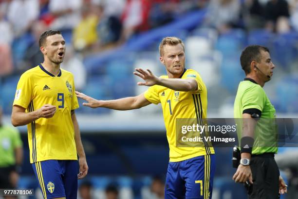 Marcus Berg of Sweden, Sebastian Larsson of Sweden, referee Joel Aguilar during the 2018 FIFA World Cup Russia group F match between Sweden and Korea...