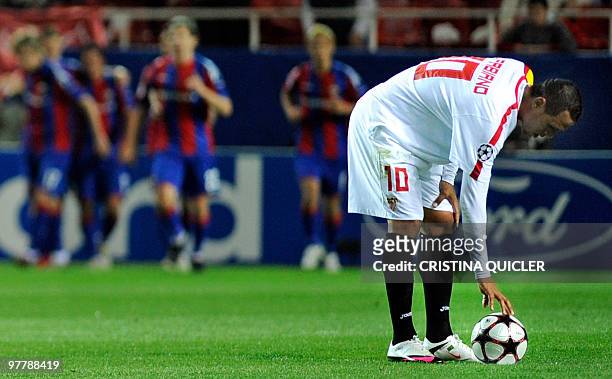 Sevilla's Brazilian forward Luis Fabiano reacts after CSKA Moscow scored during their UEFA Champions League football match on March 16, 2010 at Ramon...