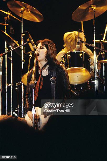 Singer-guitarist Joan Jett and drummer Sandy West of The Runaways With Joan Jett perform at Atlanta Municipal Auditorium on February 25, 1978 in...