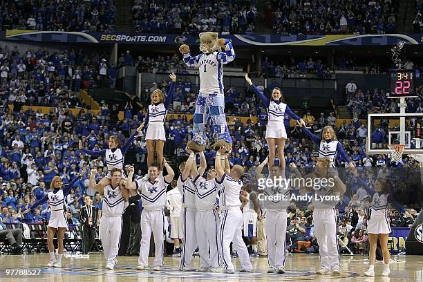 The Wildcat, mascot for the Kentucky Wildcats performs with the Kentucky cheerleaders against the Mississippi State Bulldogs during the final of the...