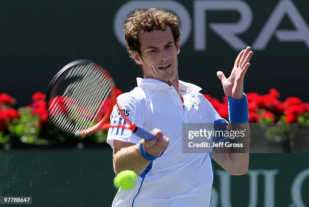 Andy Murray of Great Britain returns a forehand against Michael Russell during the BNP Paribas Open at the Indian Wells Tennis Garden on March 16,...