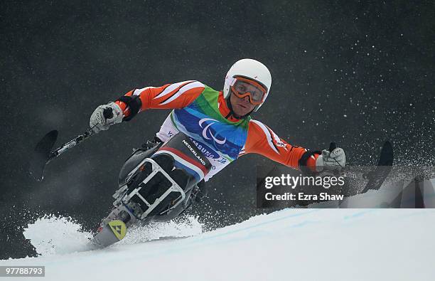 Kees-Jan van der Klooster of the Netherland competes in the Men's Sitting Giant Slalom during Day 5 of the 2010 Vancouver Winter Paralympics at...