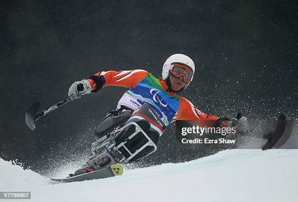 Kees-Jan van der Klooster of the Netherland competes in the Men's Sitting Giant Slalom during Day 5 of the 2010 Vancouver Winter Paralympics at...