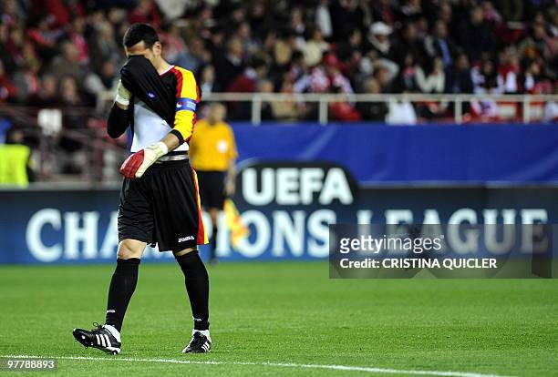 Sevilla's goalkeeper Andres Palop reacts after loosing a UEFA Champions League football match against CSKA Moscow on March 16, 2010 at Ramon Sanchez...