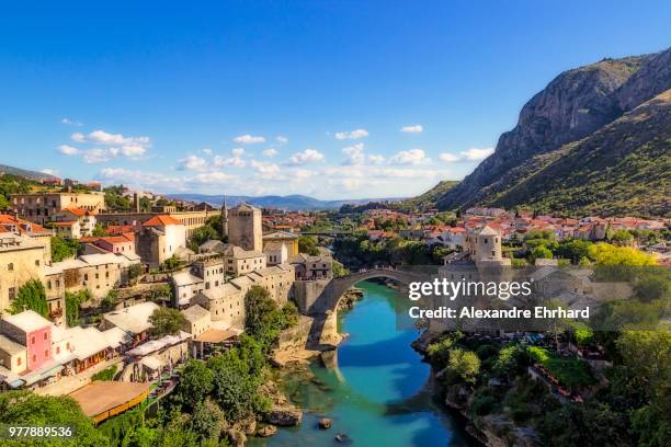 old bridge area of the old city of mostar in bosnia and herzegovina. - mostar stock pictures, royalty-free photos & images