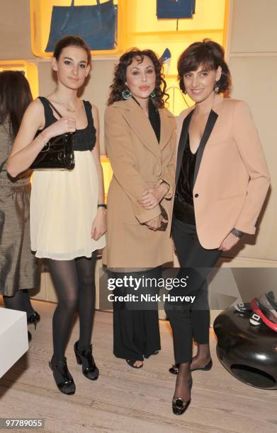 Nina D'Urso, Marie Helvin and Ines de la Fressange attend the cocktail party for the launch of the 'Miss Viv' handbag collection by Roger Vivier on...
