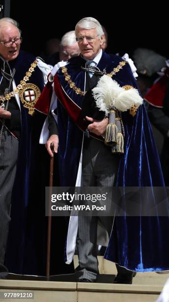 Former Prime Minister Sir John Major leaves St George's Chapel after attending the annual Order of The Garter Service at Windsor Castle on June 18,...
