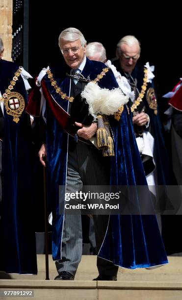 Former Prime Minister Sir John Major leaves St George's Chapel after attending the annual Order of The Garter Service at Windsor Castle on June 18,...