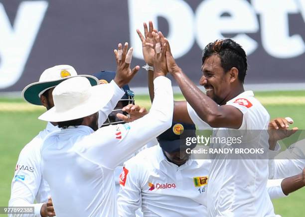 Suranga Lakmal of Sri Lanka celebrates the dismissal of Roston Chase of West Indies during day 5 of the 2nd Test between West Indies and Sri Lanka at...