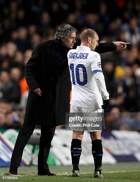 Jose Mourinho, Coach of Inter Milan gives instructions to Wesley Sneijder of Inter Milan during the UEFA Champions League Round of 16 second leg...