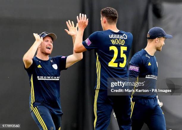Hampshire's Liam Dawson celebrates with Bowler Chris Wood, after Wood takes the wicket of Yorkshire's Tim Bresnan during the Royal London One Day...