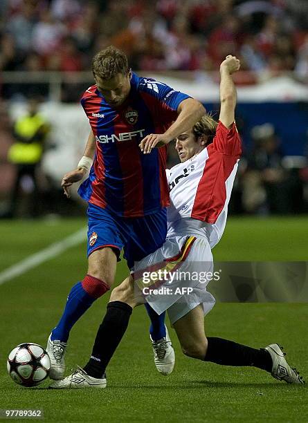 Sevilla's midfielder Diego Capel vies with CSKA Moscow's Russian defender Aleksei Berezutski during their UEFA Champions League football match on...