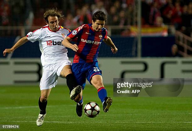Sevilla's midfielder Diego Capel vies with CSKA Moscow's Russian midfielder Evgeni Aldonin during their UEFA Champions League football match on March...