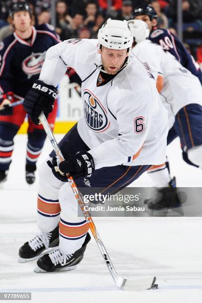 Defenseman Ryan Whitney of the Edmonton Oilers skates with the puck against the Columbus Blue Jackets on March 15, 2010 at Nationwide Arena in...