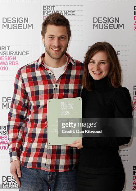 Dan Heaf and Melanie Hayes from The Newspaper Club, celebrate winning the Graphics category at the Brit Insurance Design Awards at the Design Museum...