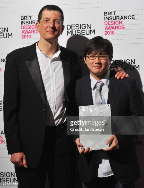 Min-Kyu Choi accepts the Brit Insurance Design of the Year Award from jury chair Antony Gormley at the Design Museum on March 16, 2010 in London,...