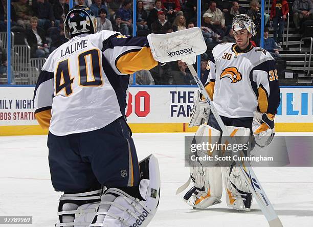 Ryan Miller of the Buffalo Sabres is replaced by Patrick Lalime during the first period against the Atlanta Thrashers at Philips Arena on March 16,...