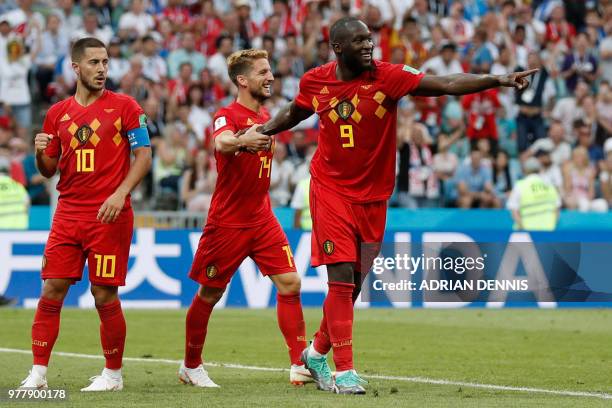 Belgium's forward Romelu Lukaku celebrates with Belgium's forward Dries Mertens and Belgium's forward Eden Hazard after scoring a goal during the...