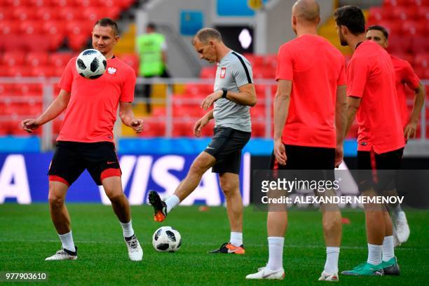 Poland's defender Artur Jedrzejczyk controls the ball during a training on June 18, 2018 on the eve of their Russia 2018 World Cup Group H football...