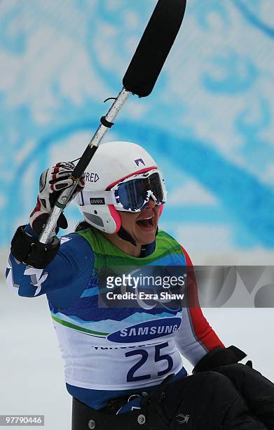 Alana Nichols of USA celebrates as she crosses the line to win gold in the Women's Sitting Giant Slalom during Day 5 of the 2010 Vancouver Winter...