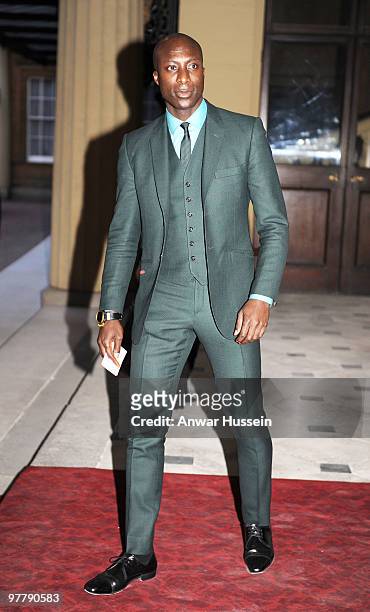 Fashion designer Ozwald Boateng arrives at a reception for the British Clothing Industry at Buckingham Palace on March 16, 2010 in London, England