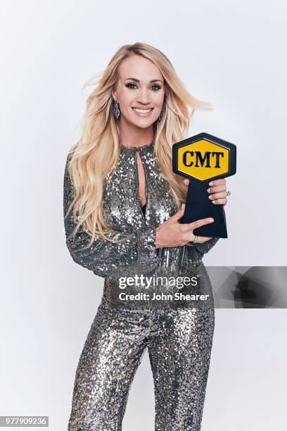 Carrie Underwood poses with CMT award for Female Video of the Year at the 2018 CMT Music Awards Show: Portrait Studio at Bridgestone Arena on June 6,...