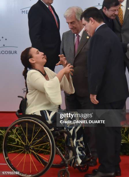 Argentine Vice-President Gabriela Michetti , Uruguay's President Tabare Vazquez and Paraguay's President Horacio Cartes chat before posing for the...