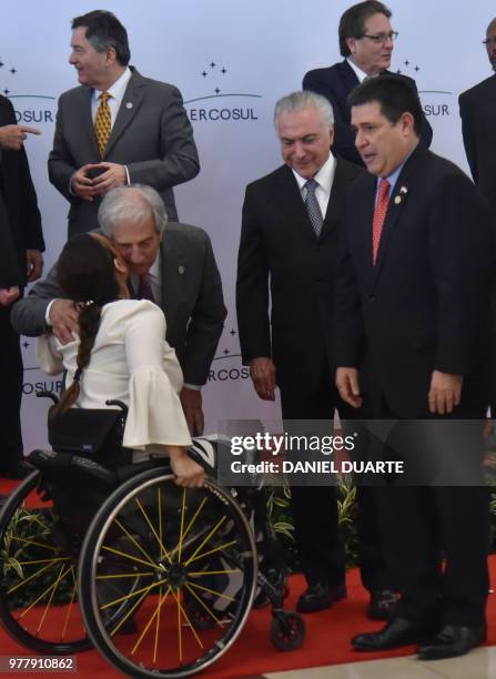 Uruguay's President Tabare Vazquez greets Argentine Vice-President Gabriela Michetti as Brazil's President Michel Temer and Paraguay's President...