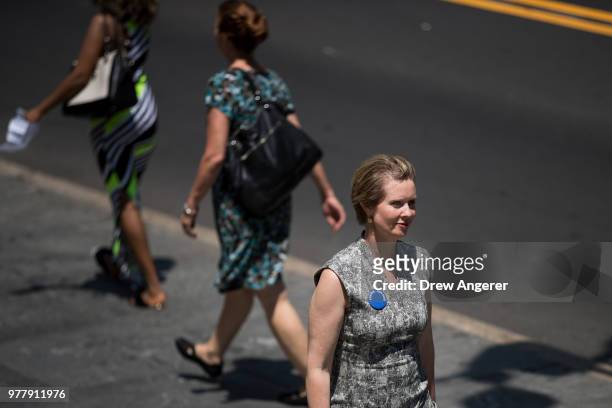 New York gubernatorial candidate Cynthia Nixon walks toward the Old New York County Courthouse for a new conference about her new campaign finance...