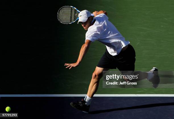 Andy Roddick returns a forehand to Thiemo De Bakker of the Netherlands during the BNP Paribas Open at the Indian Wells Tennis Garden on March 16,...