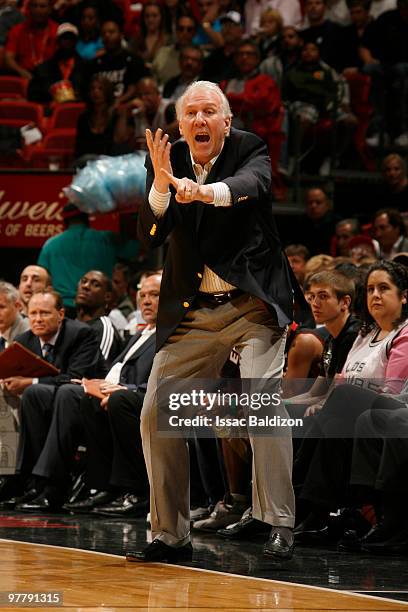 San Antonio Spurs head coach Gregg Popovich leads his team against the Miami Heat on March 16, 2010 at American Airlines Arena in Miami, Florida....