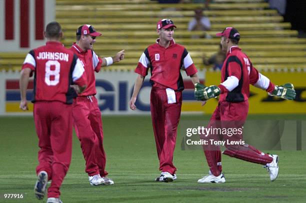 South Australian fieldsmen celebrate after Brett Vaugha caught New South Wales captain Shane Lee off the bowling of Ben Johnson for 66 in the...