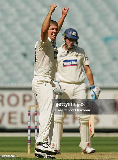 James Hopes of the Bulls appeals successfully to dismiss David Hussey of the Bushrangers during day one of the Sheffield Shield Final between the...