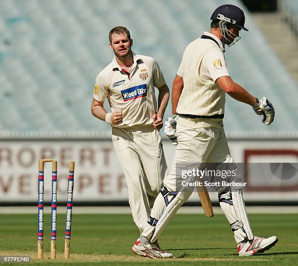 Chris Swan of the Bulls celebrates after bowling Nick Jewell of the Bushrangers during day one of the Sheffield Shield Final between the Victorian...