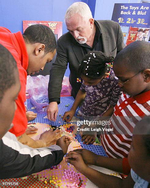 John Ratzenberger helps build a "Toy Story" LEGO mural to benefit the Boys & Girls Club of America on March 16, 2010 in Alexandria, Virginia.