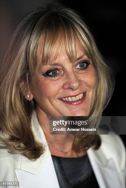 Model Twiggy arrives at a reception for the British Clothing Industry at Buckingham Palace on March 16, 2010 in London, England