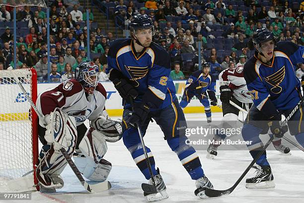 Brad Boyes of the St. Louis Blues skates in front of Peter Budaj of the Colorado Avalanche on March 16, 2010 at Scottrade Center in St. Louis,...