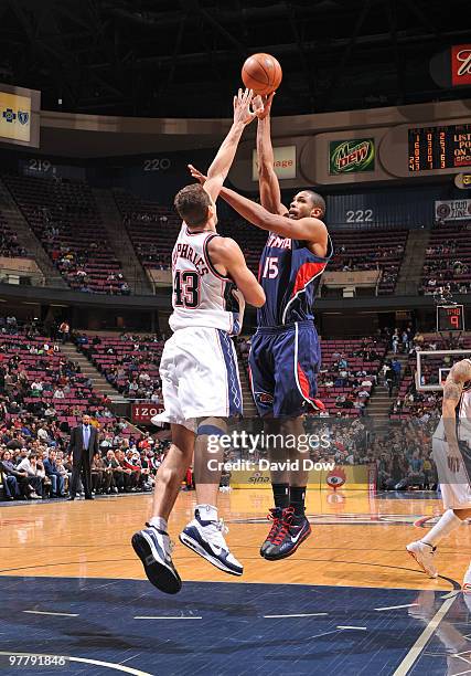 Al Horford of the Atlanta Hawks shoots the basketball against Kris Humphries of the New Jersey Nets on March 16, 2010 at the Izod Center in East...