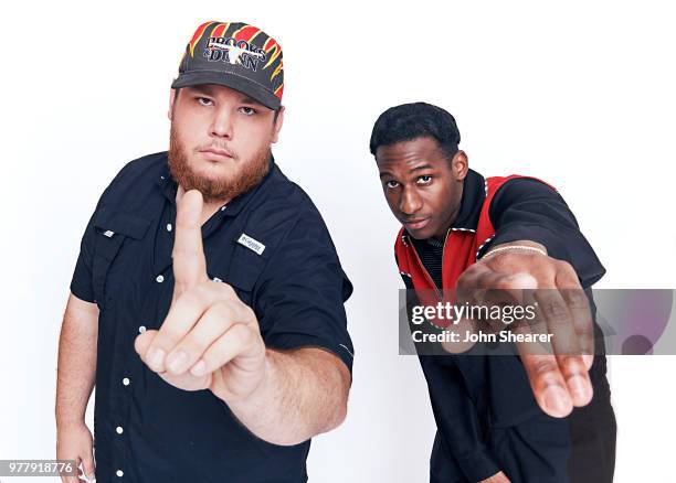 Luke Combs and Leon Bridges pose at the 2018 CMT Music Awards Show: Portrait Studio at Bridgestone Arena on June 6, 2018 in Nashville, Tennessee.