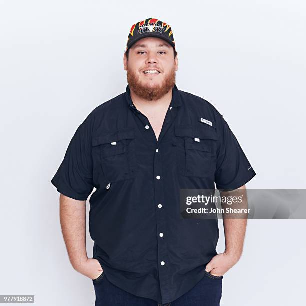 Luke Combs poses at the 2018 CMT Music Awards Show: Portrait Studio at Bridgestone Arena on June 6, 2018 in Nashville, Tennessee.